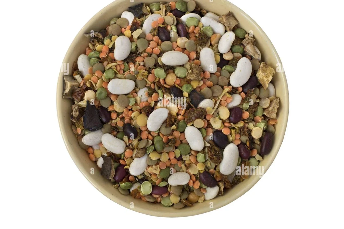 A hearty pot of vegetable soup featuring a mix of colorful rehydrated vegetables in a clear broth.