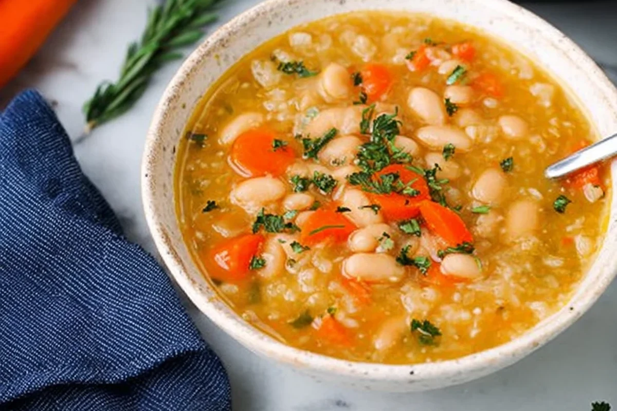 Easy Instant Pot Soup Recipe | Quick, Healthy & Flavorful One-Pot Meals 1 A steaming bowl of hearty vegetable and chicken soup prepared in an Instant Pot, featuring fresh herbs and root vegetables.