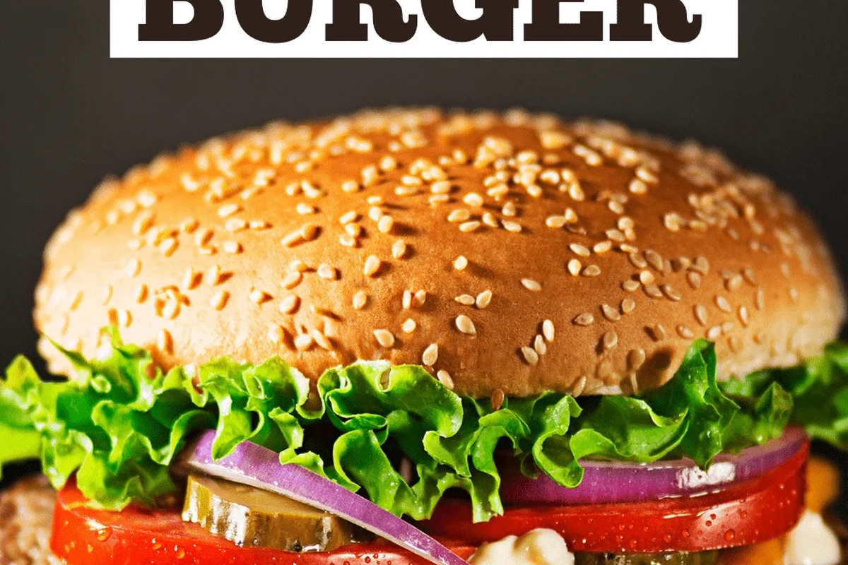 A juicy, grilled hamburger patty seasoned with onion soup mix, served on a toasted bun with fresh lettuce.