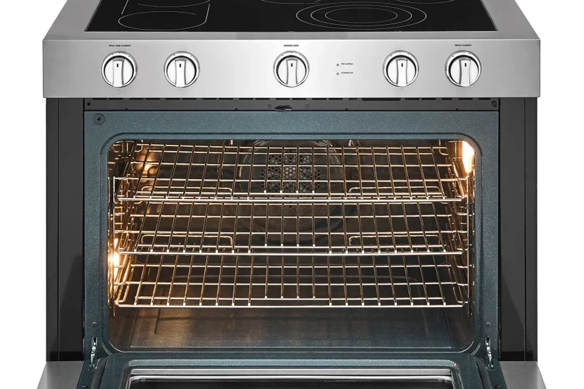 A sleek, modern 40-inch electric kitchen range featuring a wide glass cooktop and dual oven doors in a professional home kitc