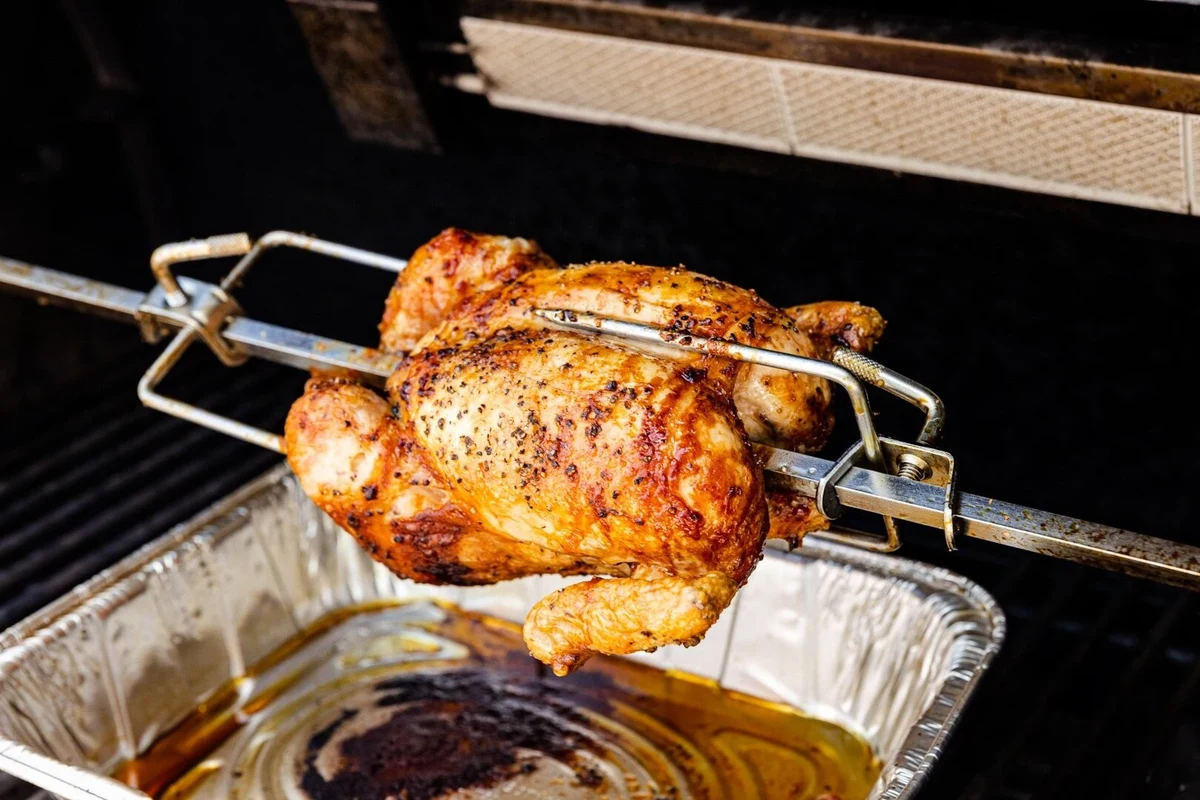 Chicken Oven Grill 2 A platter of golden-brown oven-grilled chicken thighs with a crispy charred finish.