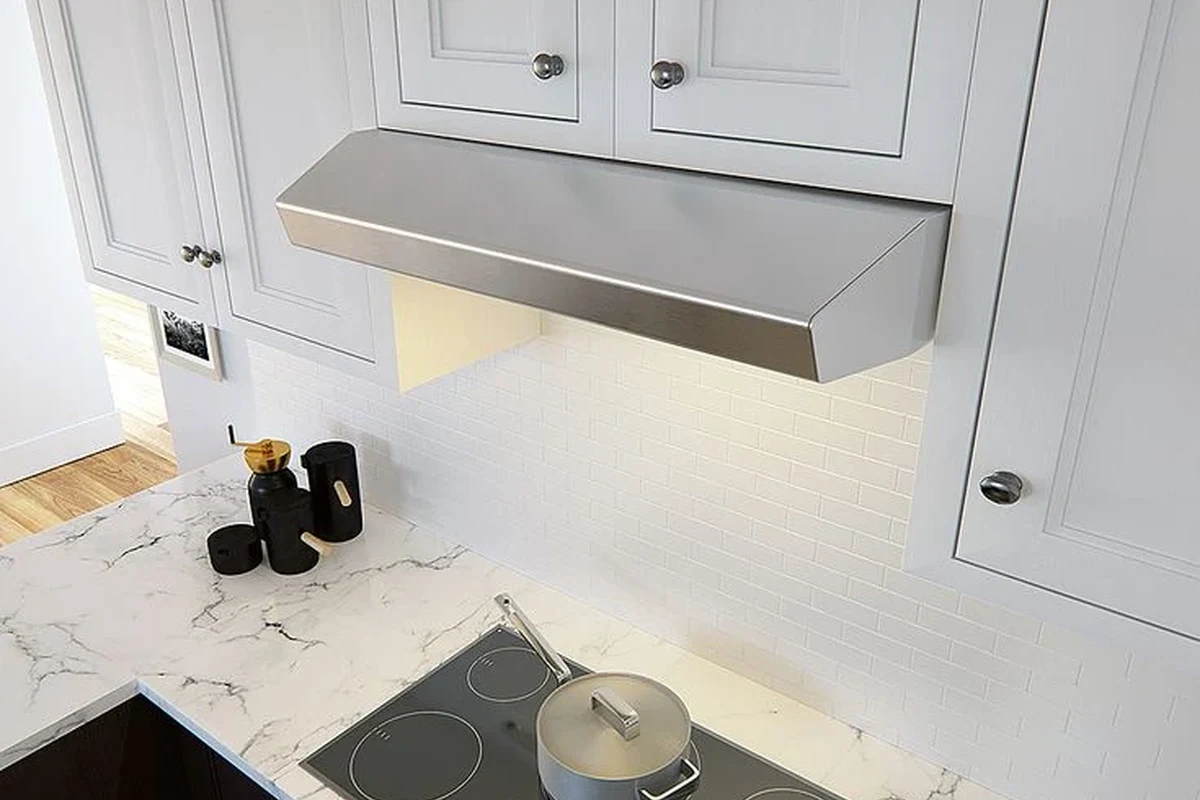 Convertible Range Hood: A Complete Buying Guide (2026) 2 A modern stainless steel convertible range hood installed above a clean kitchen stove.