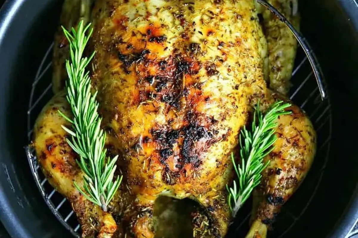 Pressure Cook Whole Chicken 2 A succulent whole chicken seasoned with Belizean spices, cooked to perfection in a pressure cooker.