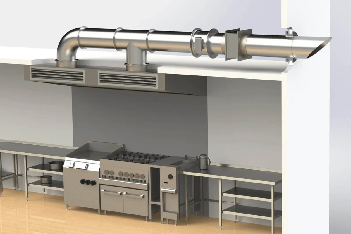 A professional-grade rigid galvanized steel range exhaust duct installed in a clean kitchen.