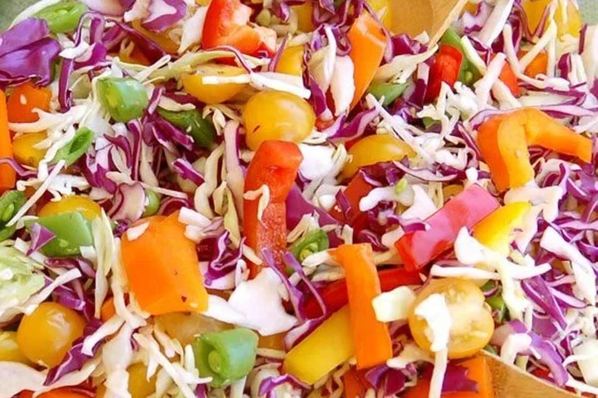 Summer Slaw Recipe 2 A bowl of fresh, crunchy summer slaw with shredded cabbage, carrots, and lime dressing.